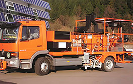Customized road marking vehicle with specialized spraying and screeding systems for various line types