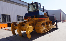 Crawler bulldozer working on heavy duty earthmoving project