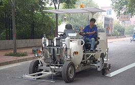 Cold painter road marker vehicle creating white road markings