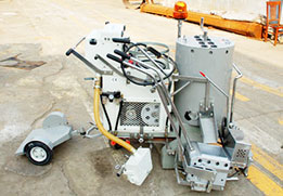 Self-propelled thermoplastic road marker with optional stand-up trailer and electric start system