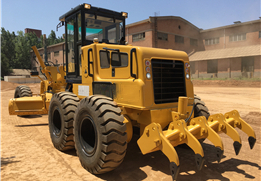 Motor grader power shift transmission with single-handle manipulation