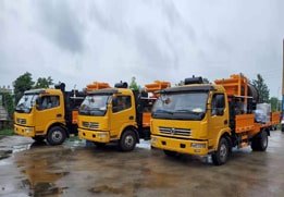 All-weather pothole patcher truck for asphalt and concrete road maintenance in various environments